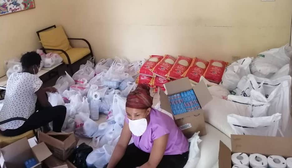 WWO team preparing emergency relief kits Jacqueline Cadeau preparing emergency relief kits