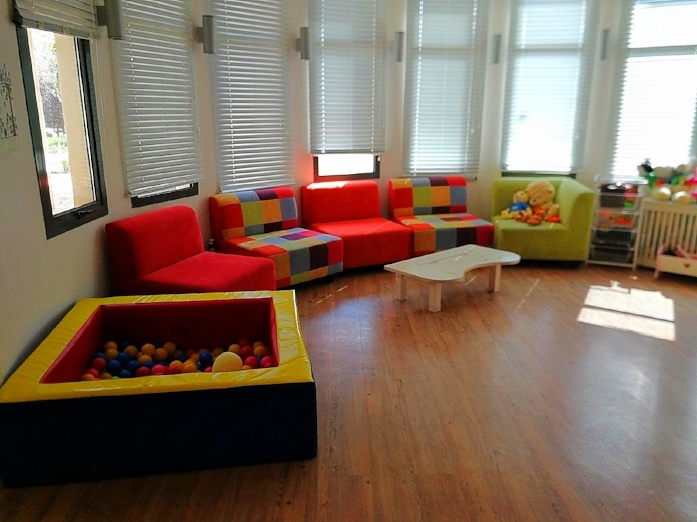 Waiting room with ball pit at Jordan River Village