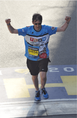 Matt DeCamara crossing finish line