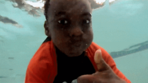 Gif showing campers swiming together at camp.